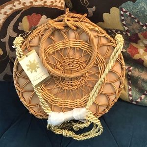 Rattan circle purse.